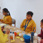 Children learning life skills through hands-on activities
