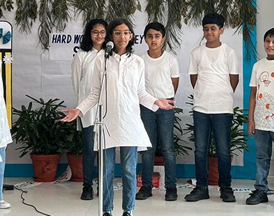 Child Practicing Public Speaking, Encouraged by Top Schools in Gurgaon