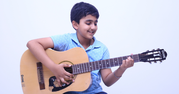 Child Exploring Hobbies in a Classroom